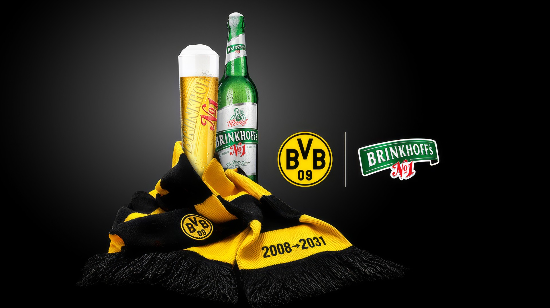 Eine Flasche Brinkhoffs und ein Brinkhoffs Glas umwickelt mit einem BVB Schaal.
